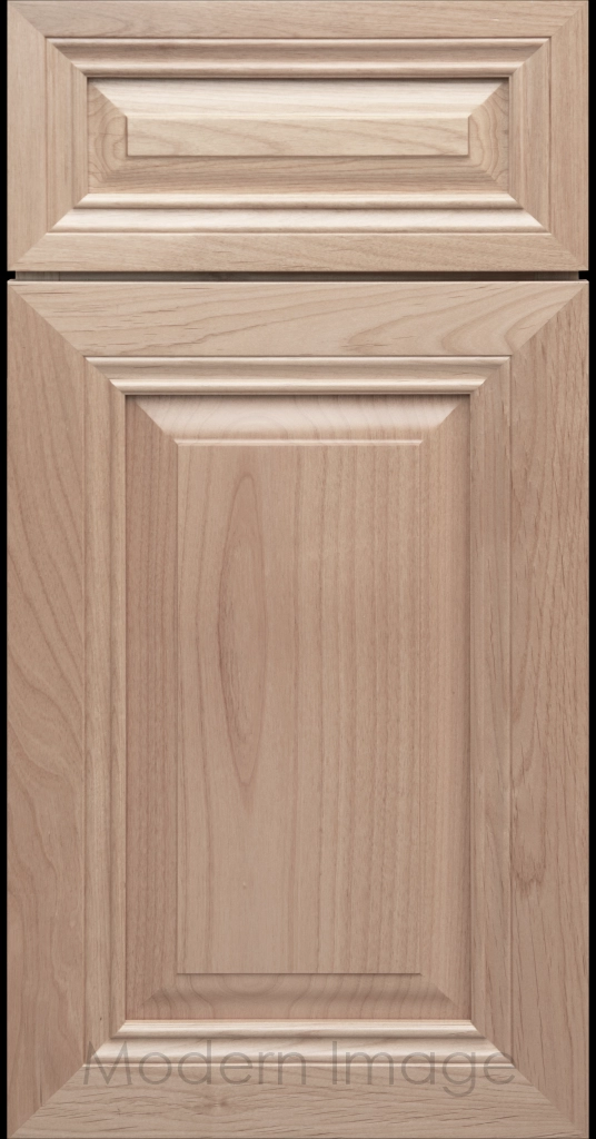 Close-up of a Ghost-matte-stained wood cabinet door with a mitered frame and traditional Cambridge raised center panel.